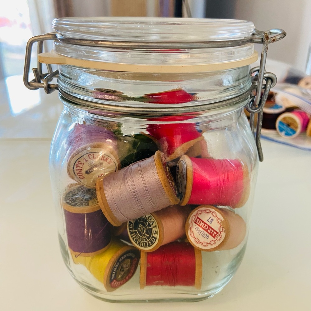 Antique Wooden Thread Spools In Vintage Italian Lido Jar